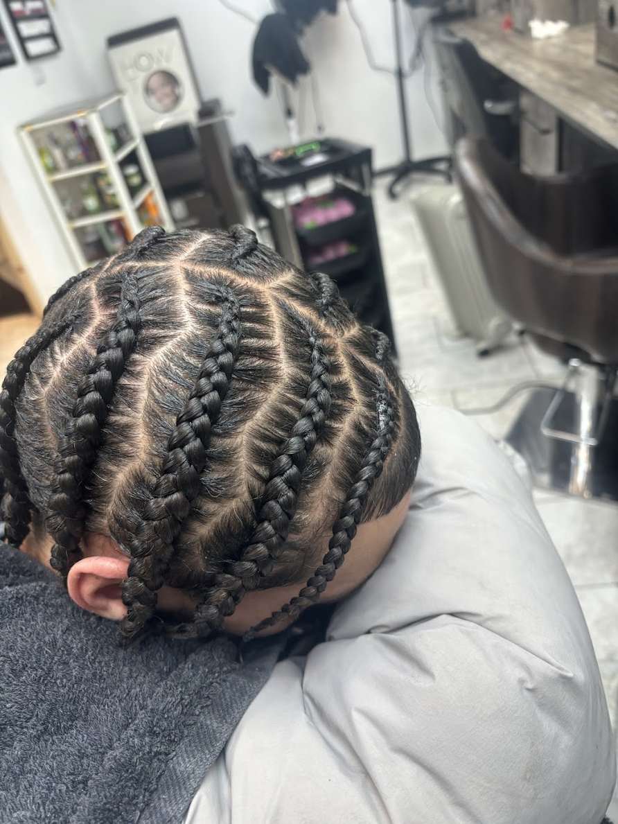 Stitch cornrows with neat parting